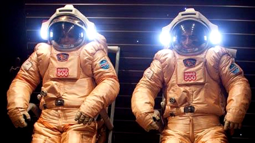 mars500 mission members test spacesuits